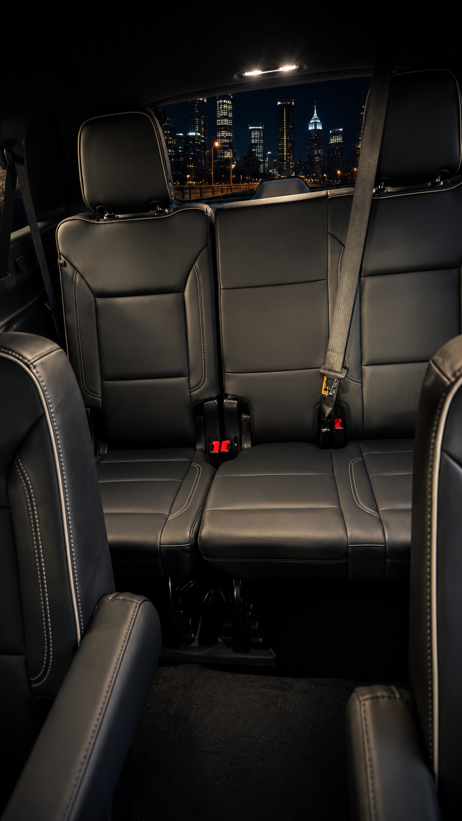 Rear seating view inside the 2026 Chevy Suburban showing spacious third-row passenger room