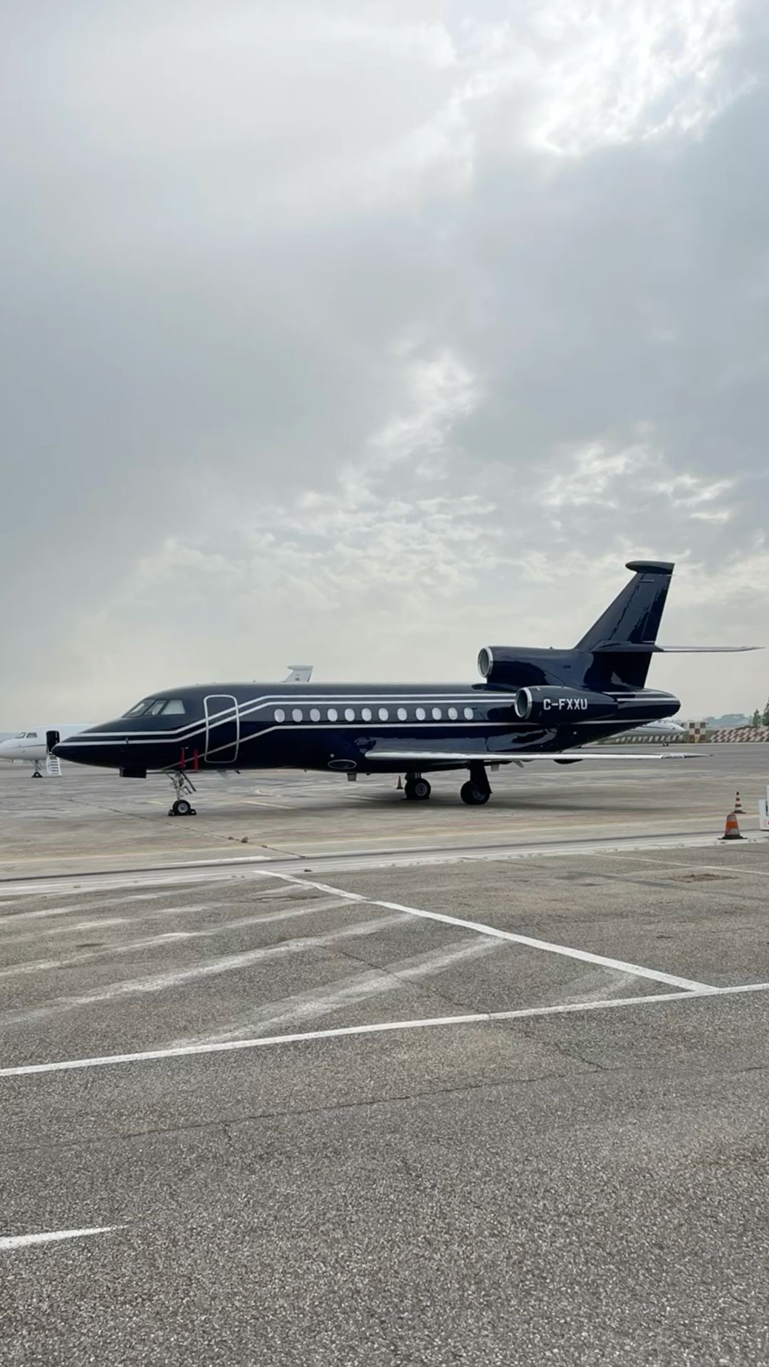 Private aircraft on a sunlit airfield
